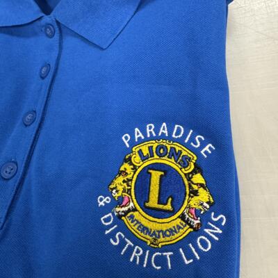 Detailed logo embroidery on a polo shirt by By L.A.W. Designs