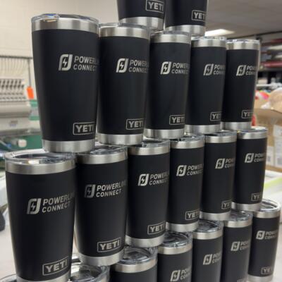 Laser-engraved branded tumblers produced by By L.A.W. Designs in Waterloo