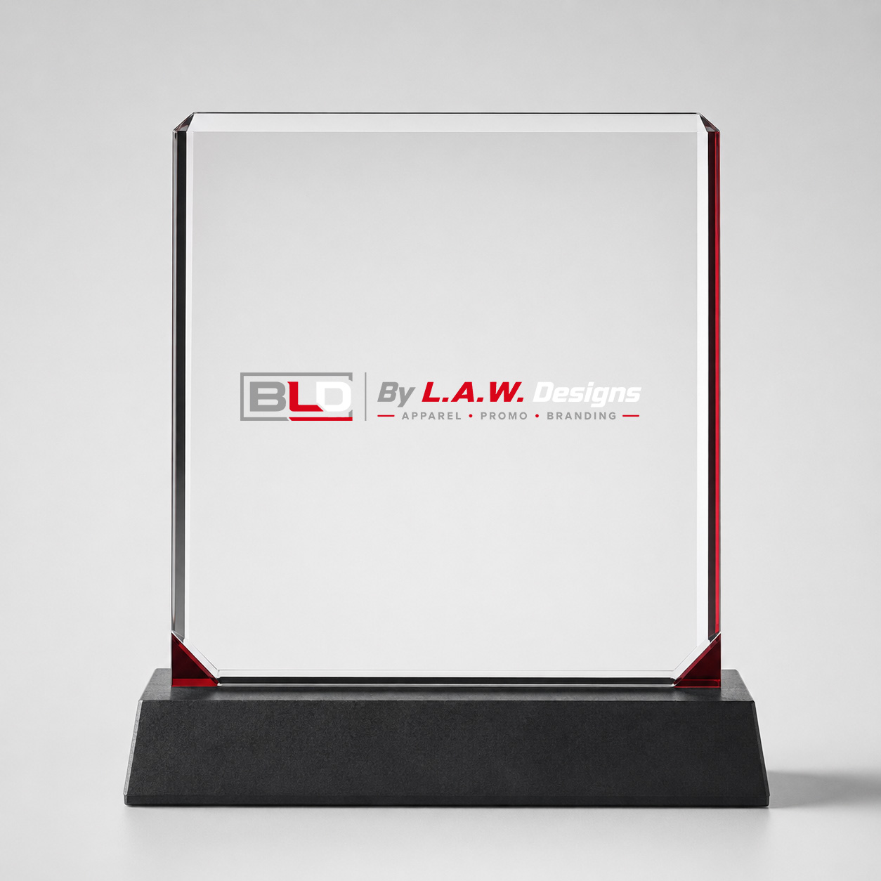 Clear acrylic recognition award decorated with the official BLD logo